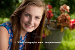 Rembrandt lighting for outdoor senior pictures in Grand Rapids